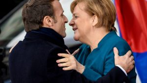 Globalist Traitors Merkel and Macron Sign treaty To Start Merging Germany and France Into One Country!
